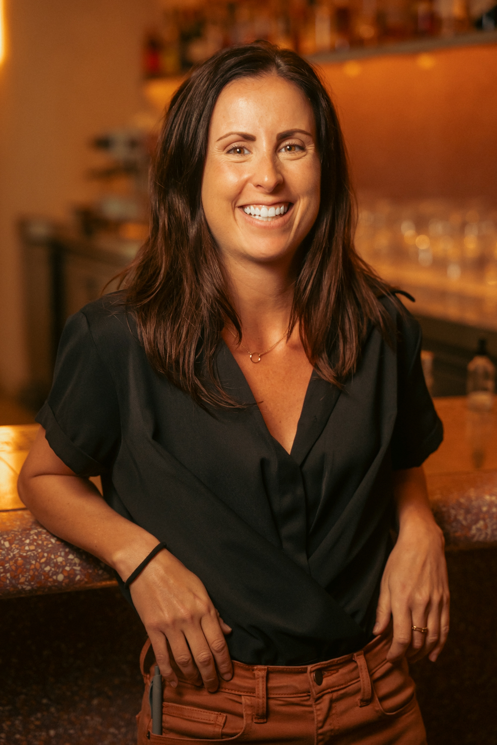 Sarah Snyder, General Manager at Ash, at the bar